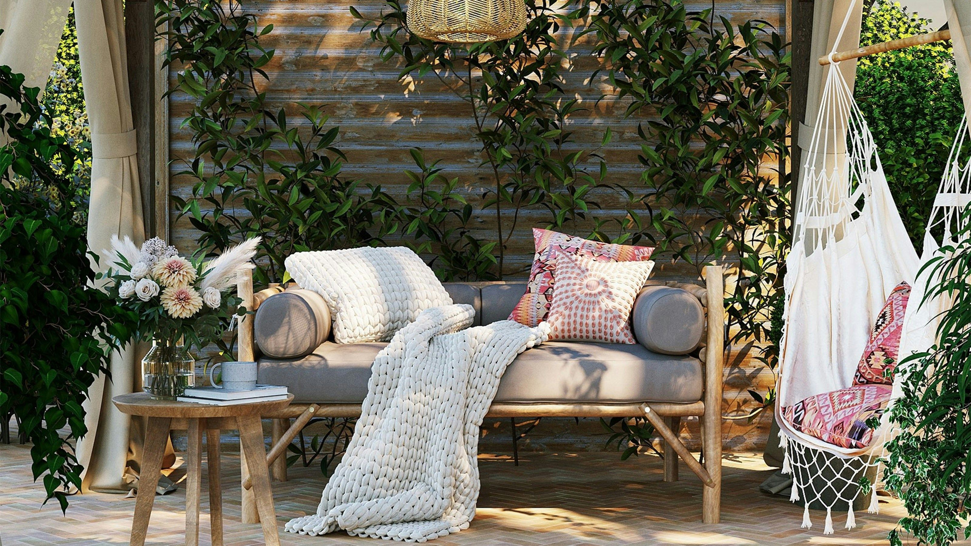 Select natural fabrics like cotton and linen for throws and pillows to create cozy, sustainable fall patio decor.